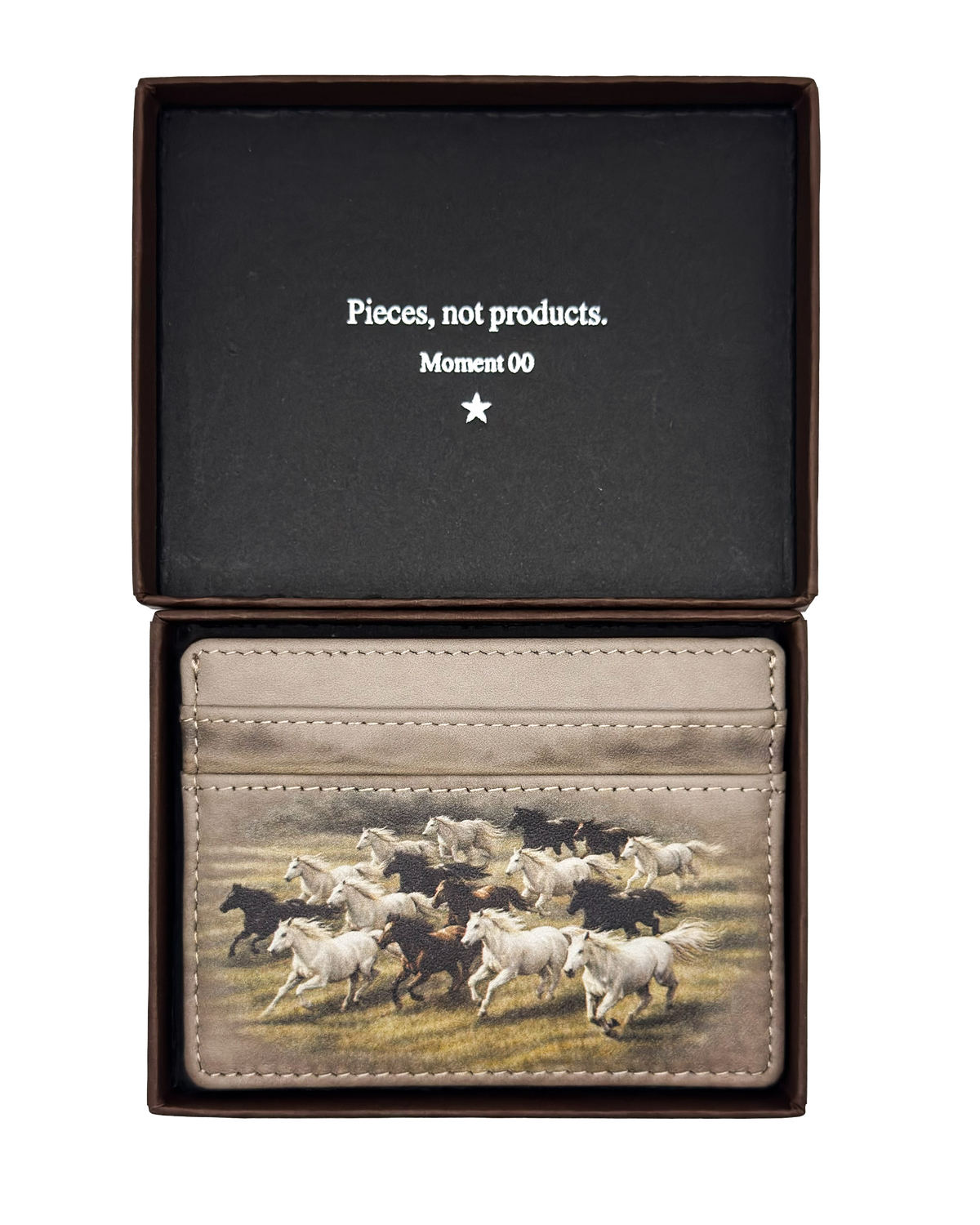 Cardholder with horse design and 'Pieces, not products' text 